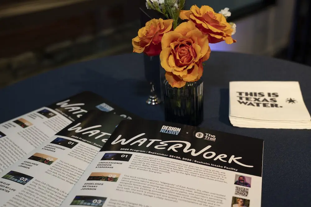 WaterWork programs and a This Is Texas Water napkin on a reception table